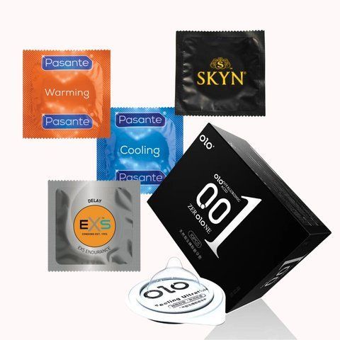 Набір: OLO/Pasante/EXS/Skyn &ndash; 28 шт: OLO Black Feeling Ultrathin з гіауроновою змазкою, 10 шт., Pasante Cooling, охолоджуючі, 2 шт., Pasante Warming розігріваючі, 2 шт. Skyn Elite Non Latex ультратонкі, безлатексні, 2 шт., NO7723 фото